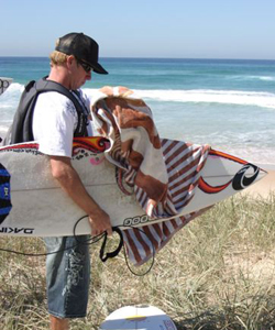 The Realm - Surfboard and Clothing